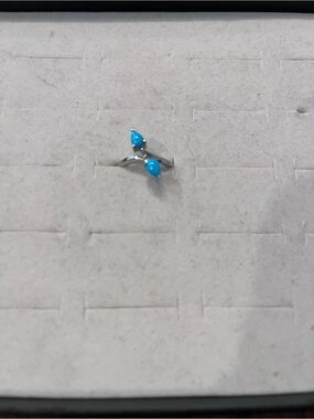 Sterling Silver Ring with Bright Turquoise Teardrop Stones